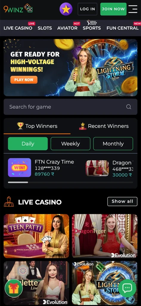 Visit the 9winz app home page and find live casino section.